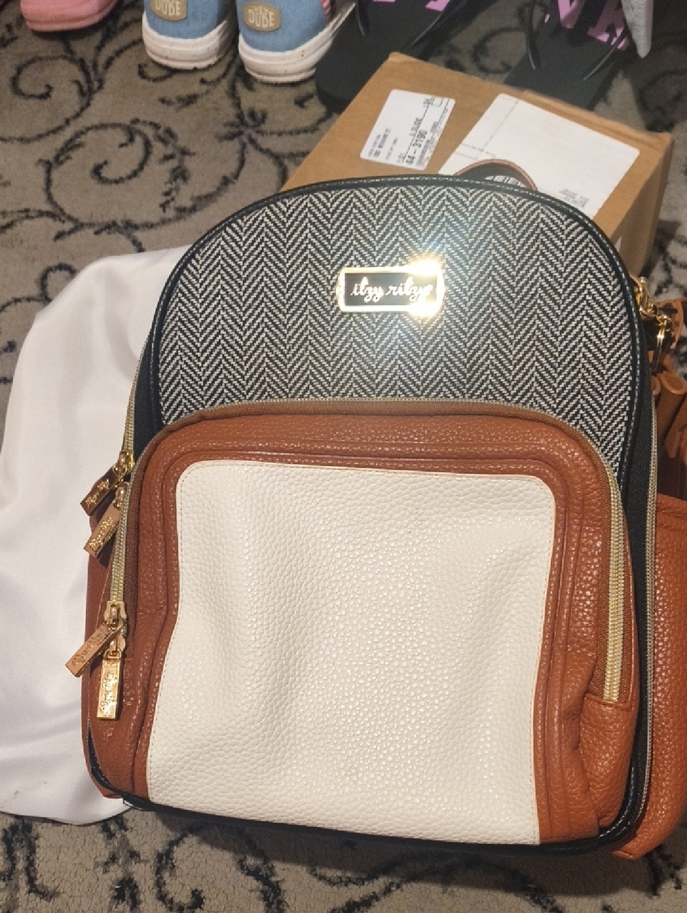Itzy Ritzy Mini Backpack — Black Herringbone, White & Brown Trim